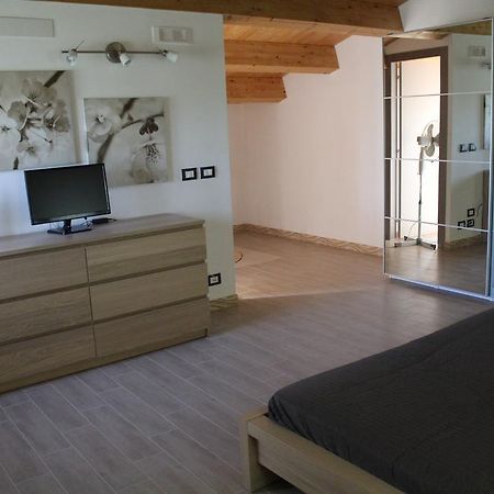Appartamento Le Tre Palme Frigintini Zimmer foto